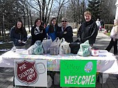 Good Kin Sue and Good Kin Lisa with some helpers at the donations table